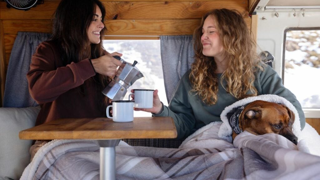 women car camping in cold