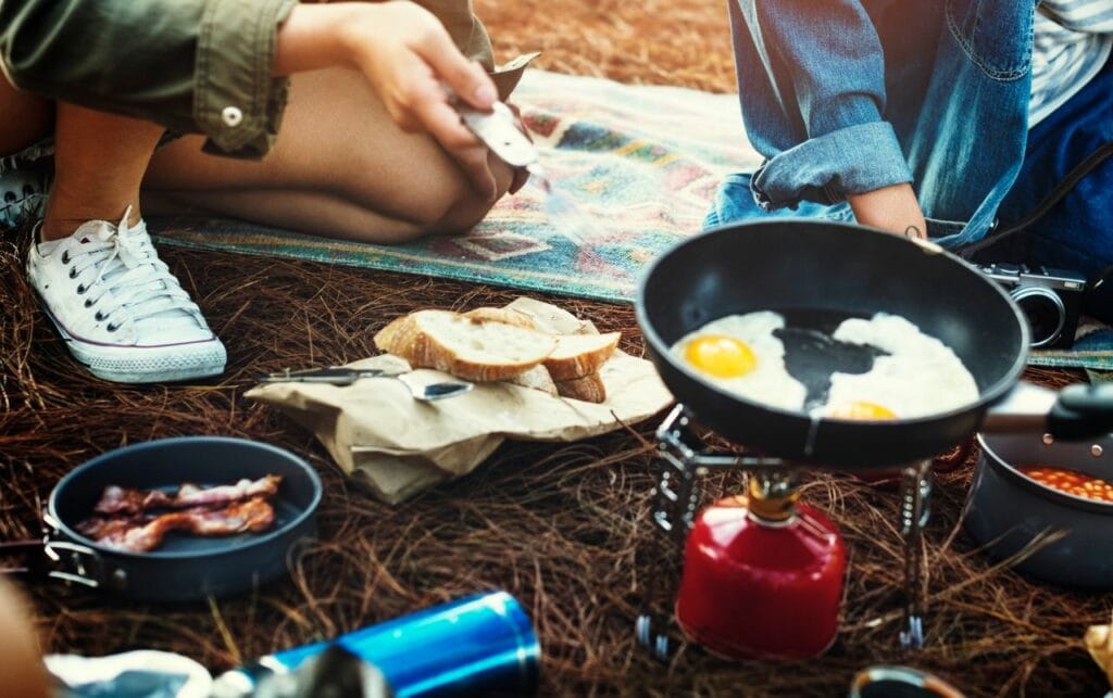 campers making breakfast