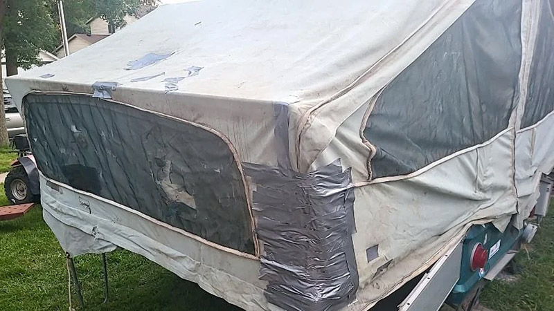 patched tent trailer canvas